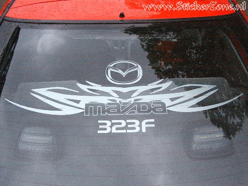 Mazda 323F met custom tribal